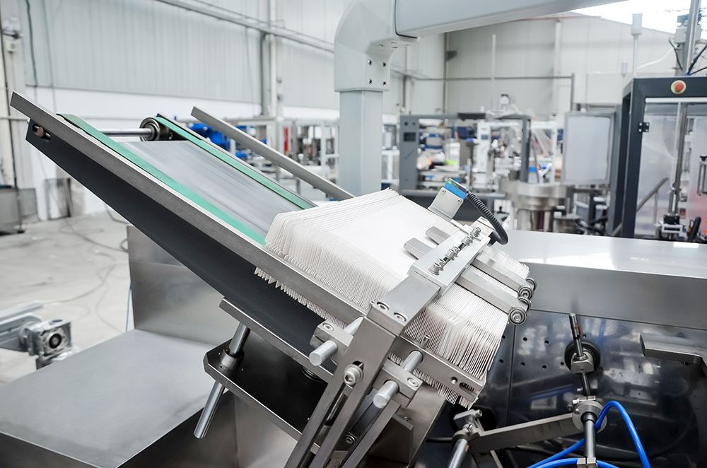 4.-Station d'alimentation en d&eacute;pliants