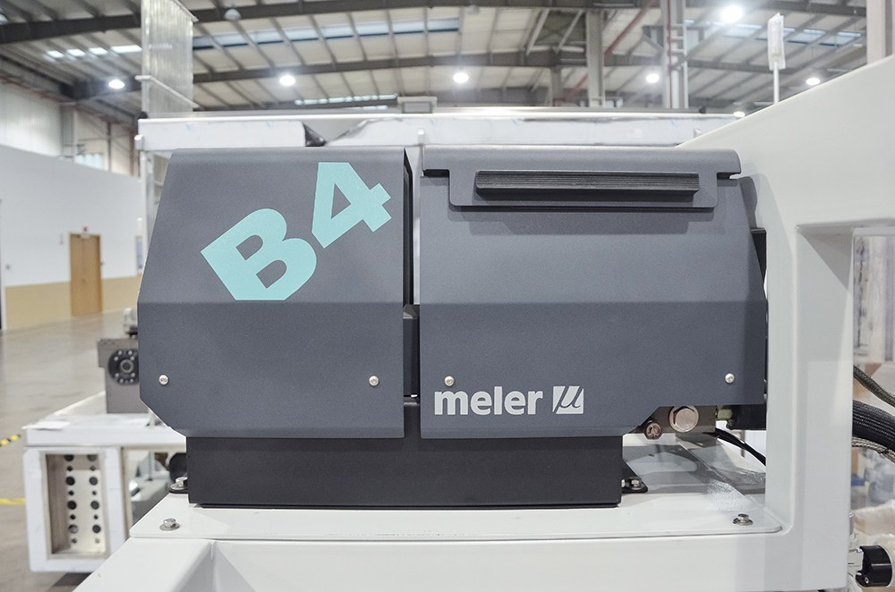 10.-Machine &agrave; colle thermofusible de marque Meler